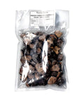 Bag of frozen black truffle pieces from Tuber Melanosporum C-grade for culinary use